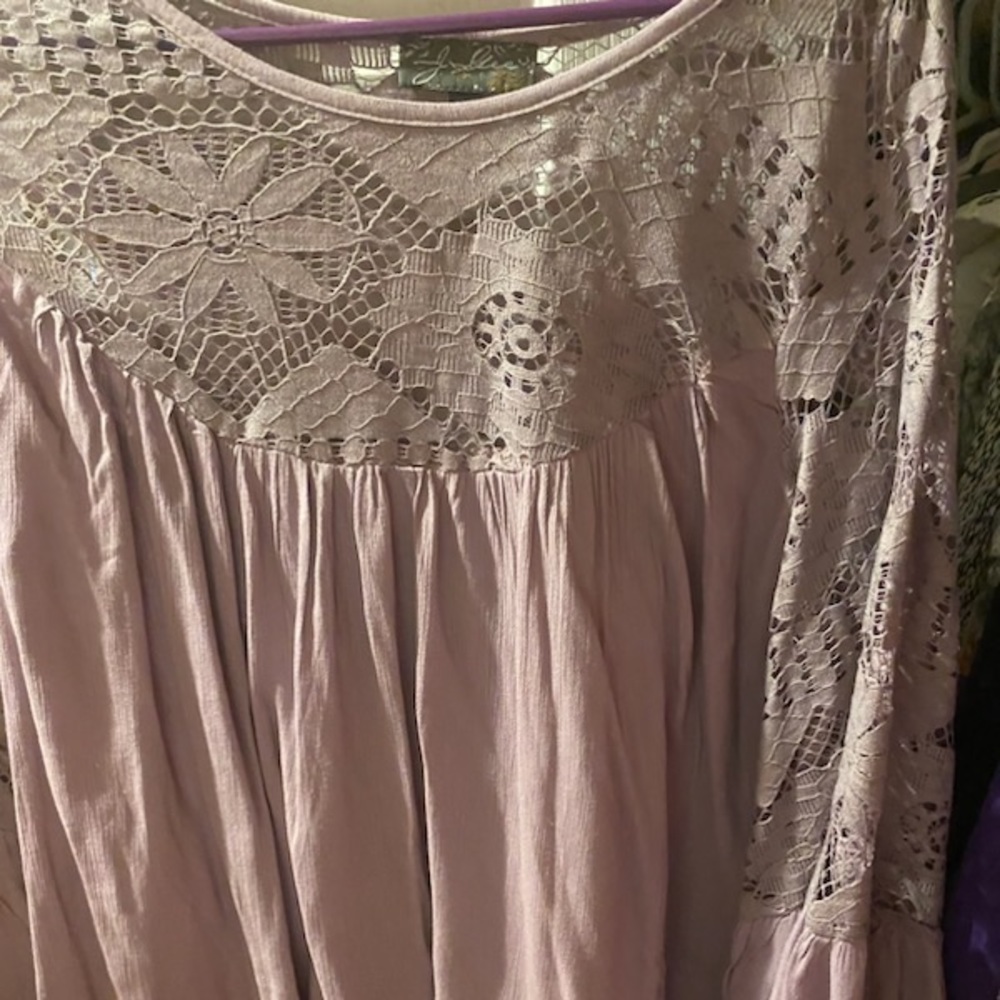 Very light lilac, crocheted top, flared bottom